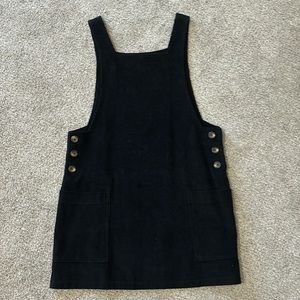 Black corduroy short with pockets.